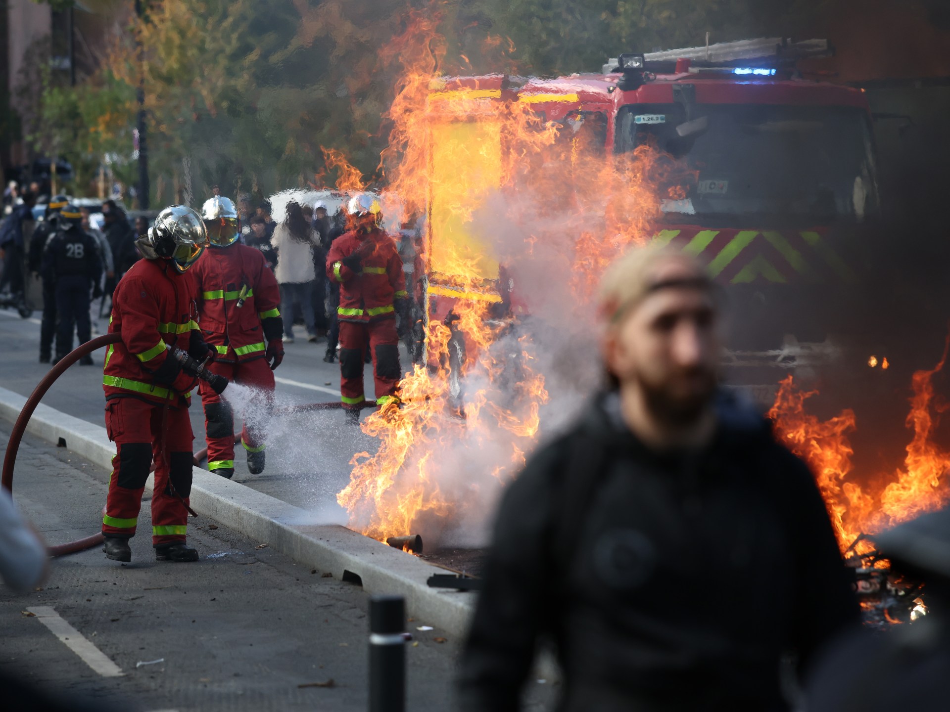 School protests spread as fires, blockades deepen unrest in France